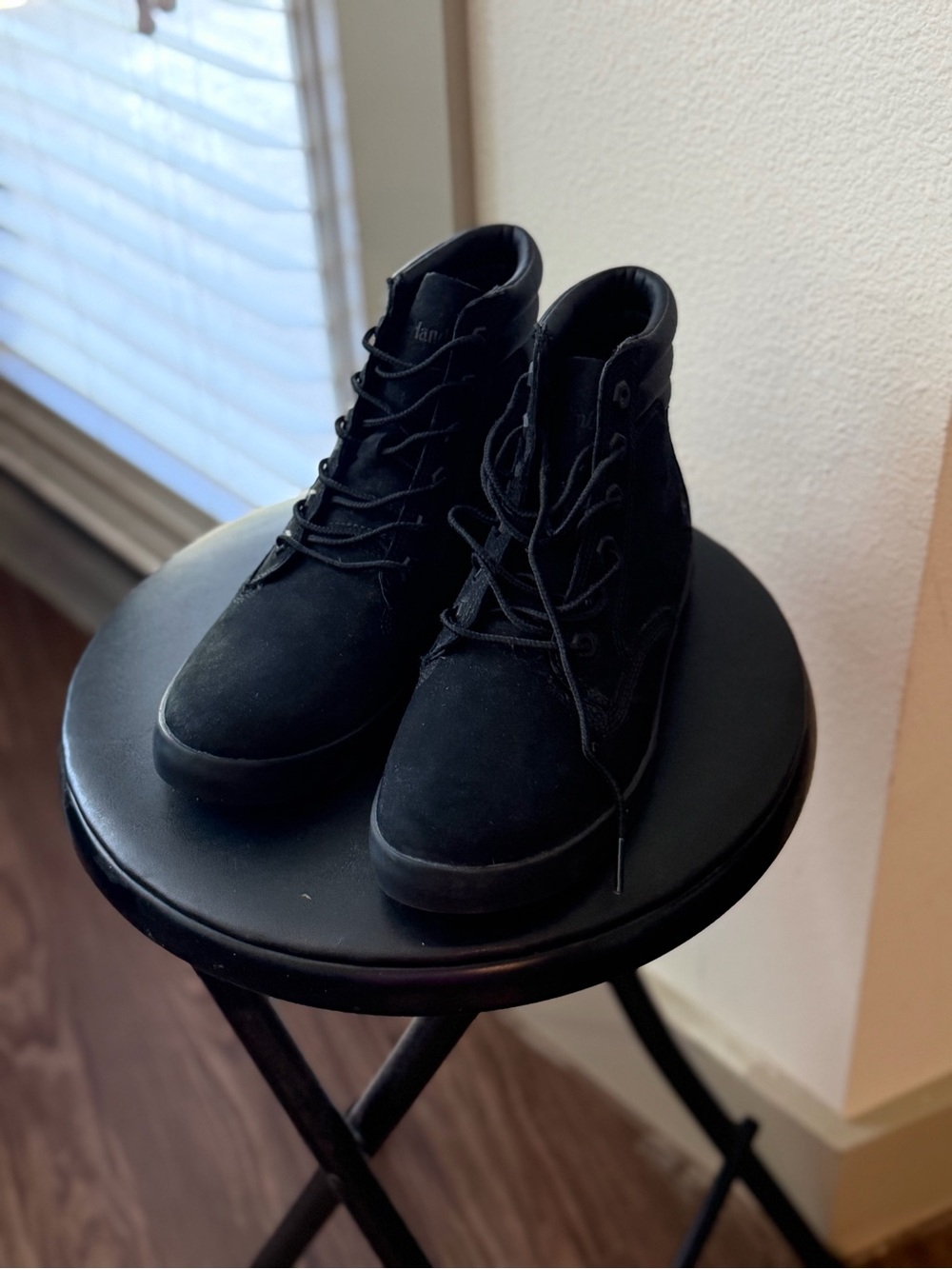 Woman’s Black High-Top Lace-Up Boots